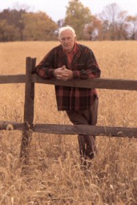 Transportation Ideas - farmer leaning on fence