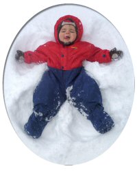 Toddler making a snow angel