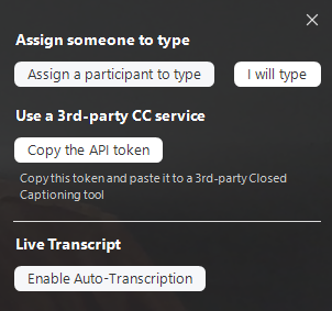 The options for assigning someone to manually write closed captions or turning on Live Transcript.