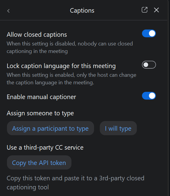 The options for assigning someone to manually write closed captions or turning on Live Transcript.