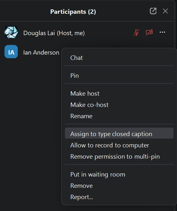 The options for assigning someone to manually write closed captions or turning on Live Transcript.